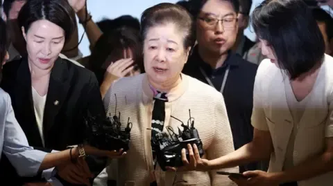 Disputed Religious Head Dismisses Bribery Allegations Involving Former South Korean President's Wife